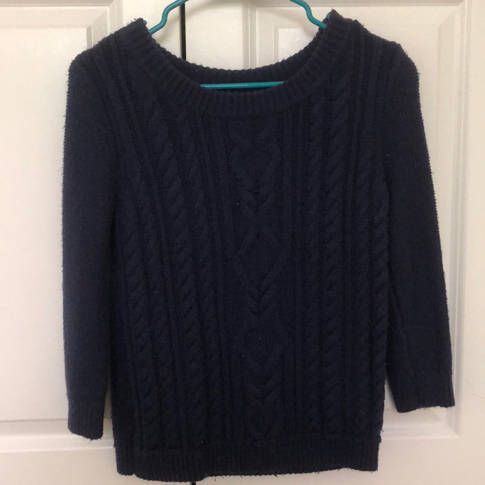 Navy knit sweater.